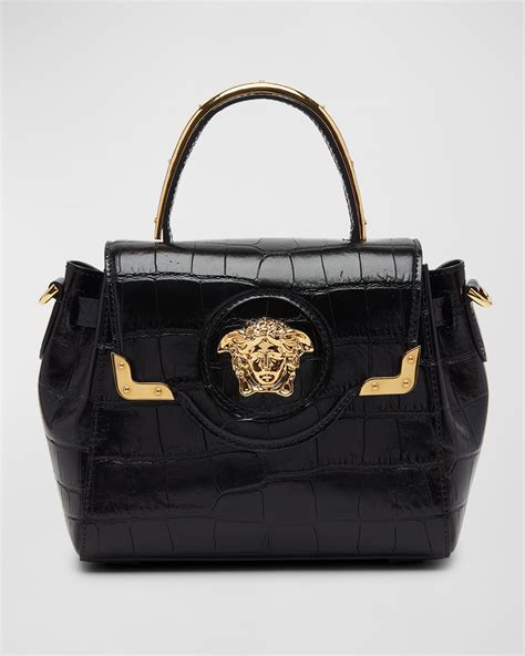 gold sparkly versace bag|Versace la medusa bag.